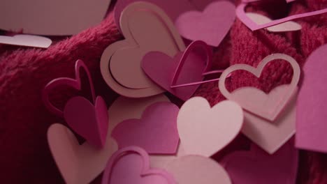 pink paper heart cut outs for valentine's day celebration