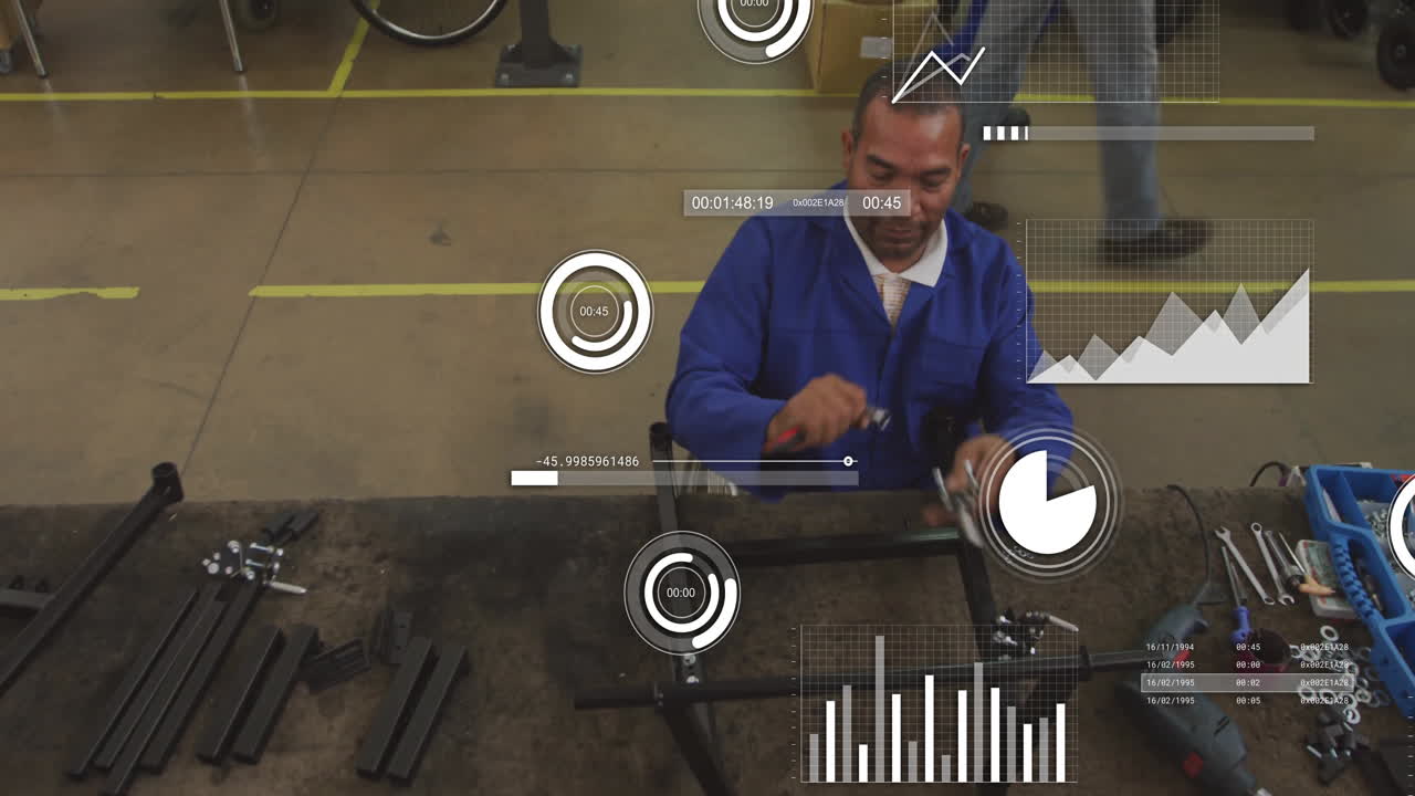 Man wearing blue work coat assembling metal frame at factory bench, showing digital data overlays