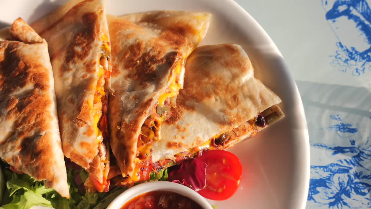 Delicious Mexican Quesadillas Served with Guacamole and Salsa