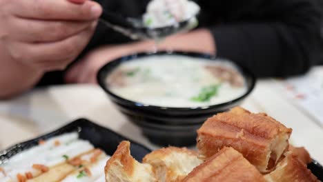 savoring traditional hong kong rice porridge meal