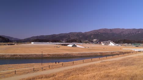 Sideways-view-of-few-tourists-walking-at-Iwate-Tsunami-Memorial-Museum