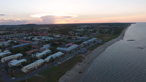 Coastline-football-field-in-Kourou-French-Guiana-by-drone-sunset-time