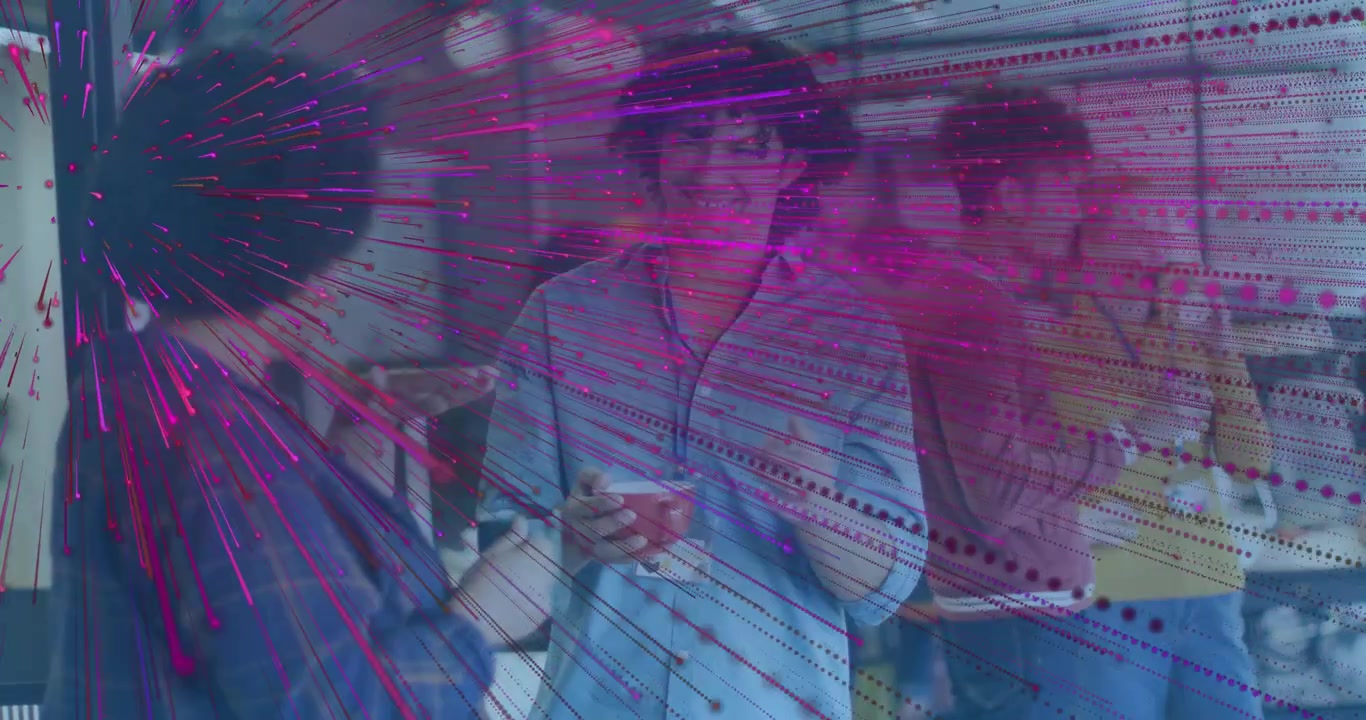 Man extending smartphone transferring data with magenta rays toward colleague in office break area