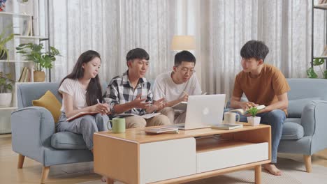 group of students studying together at home