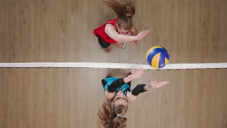 overhead view of women playing volleyball