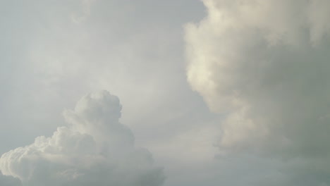 cumulus clouds forming and evolving in the heavens