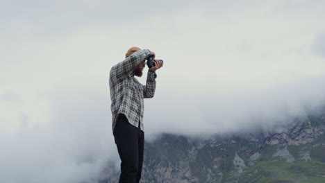 photographer capturing a mountain vista