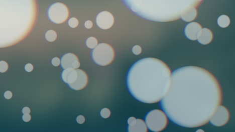 bokeh redondo que cae y partículas en gradiente de moda