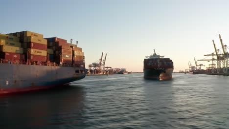 a view of container ships navigating through the harbor at sunset, showcasing the vibrant activity of maritime trade and port operations