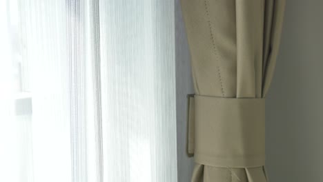 beige curtain at a window