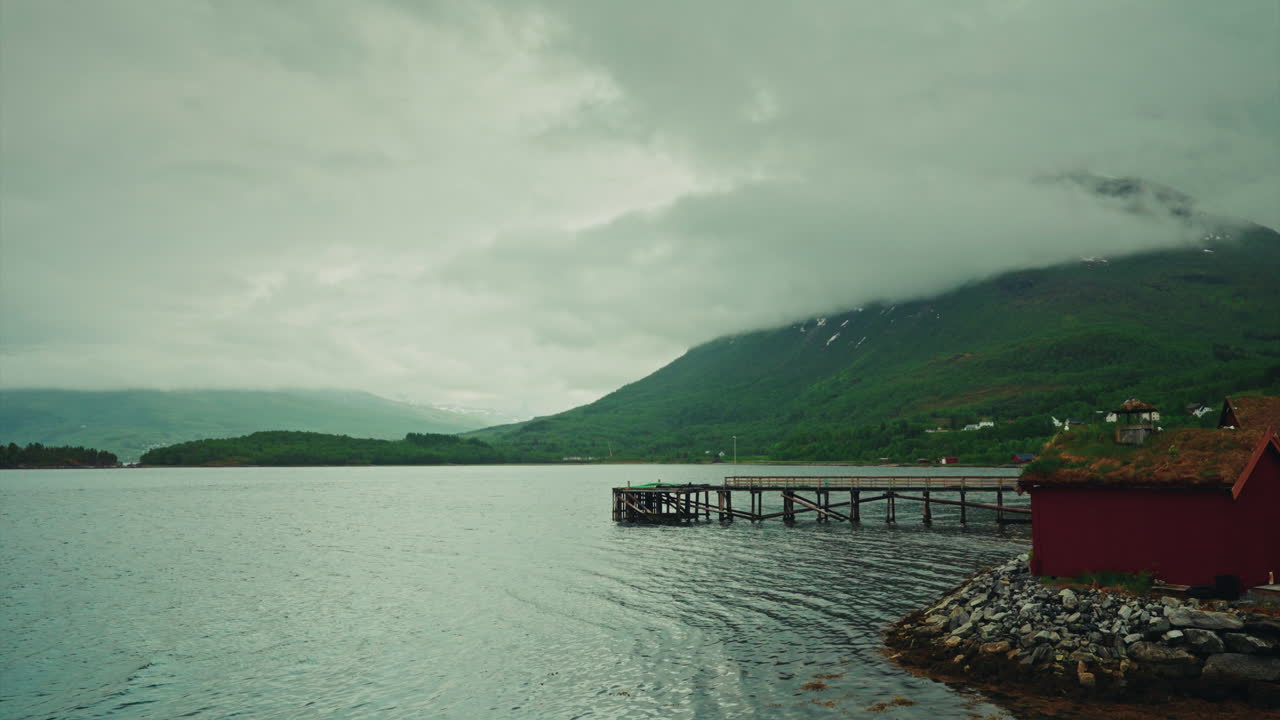 Time lapse of a dramatic nordic landscape. Cloudy dramatic sky, cold weather.