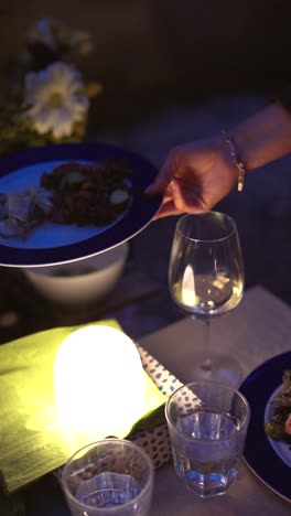 outdoor dinner party at night
