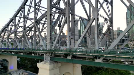 Zoomed-drone-footage-revealing-the-historic-cantilever-Story-Bridge-in-Brisbane,-Queensland-Australia