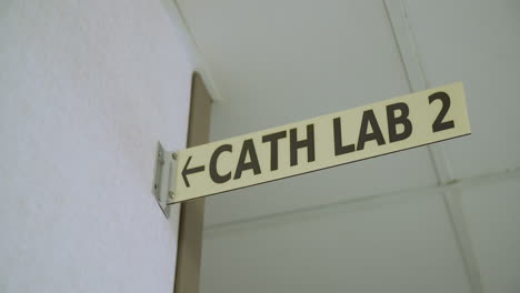 Focus-Reveal-of-Hospital-Cath-Lab-Sign---Slow-Motion---4K-UHD