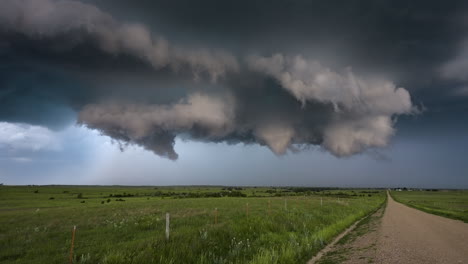 powerful storm building tornado warning dark cloud base spinning