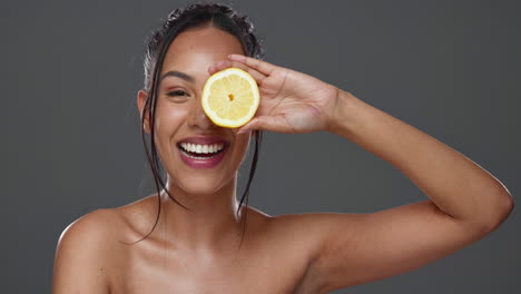 face, skincare and woman with lemon for beauty