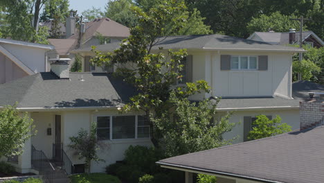 Black-Lives-Matter-sign-in-front-yard-of-surburban-house-with-rise-to-reveal-surrounding-neighborhood