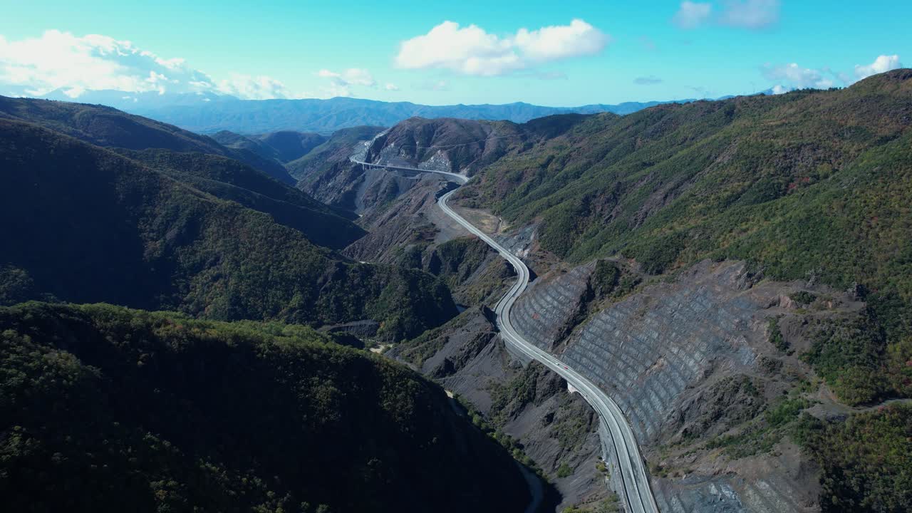 "Rruga e Kombit" Highway Transport in Albania and Kosovo Mountains During Autumn Aerial View