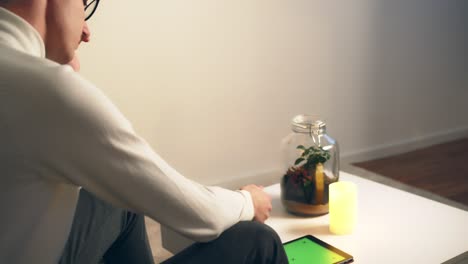 man sitting alone, contemplative mood