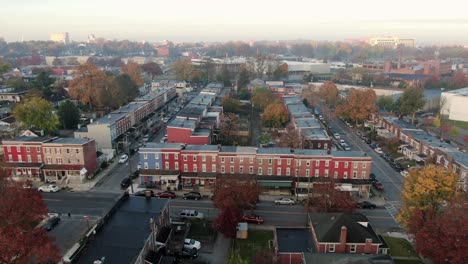 aerial establishing shot of colorful row homes in city of lancaster, pennsylvania usa during autumn