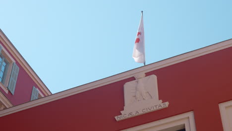 nice city hall building exterior with flag