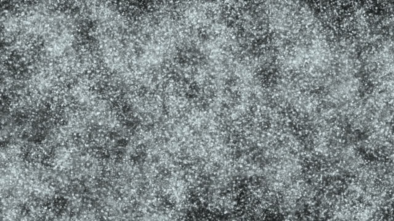 efectos visuales, vfx, partículas blancas, nieve arrojada y cubriendo la vista en fondo negro animación 2d