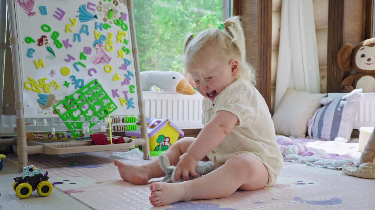 Adorable Toddler Playing with Toys in Playroom