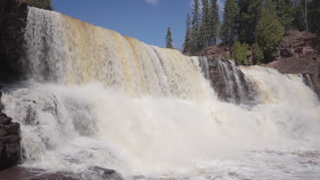 Gooseberry-Falls-Flowing-Over-Rocks-in-Sunny-Weather