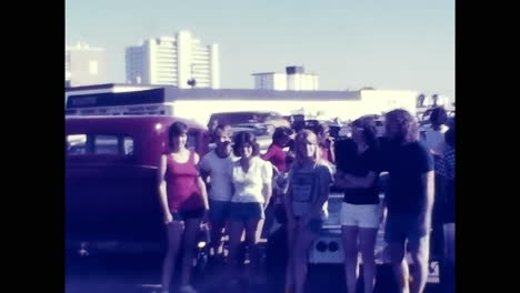 group of vintage cars parked in a 1970s usa old car show. circa usa - 1970s: a fascinating display of various old cars from the 1970s parked together at a vintage car show in the usa.