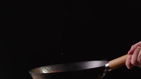 stir-frying in a wok