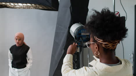 photographer setting up reflector