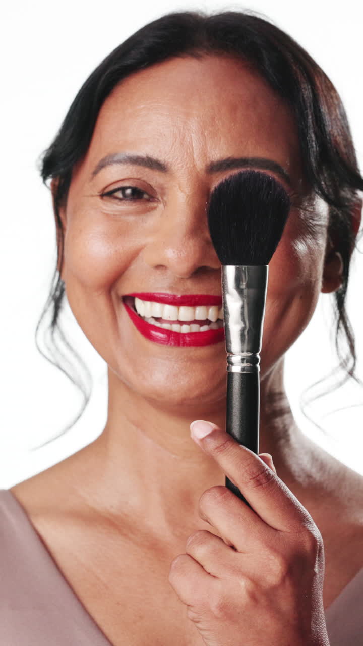 Happy Woman Smiling and Posing with Makeup Brush