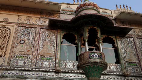 historical palace artistic exterior wall design at morning from different angle video is taken at city palace, udaipur rajasthan india.