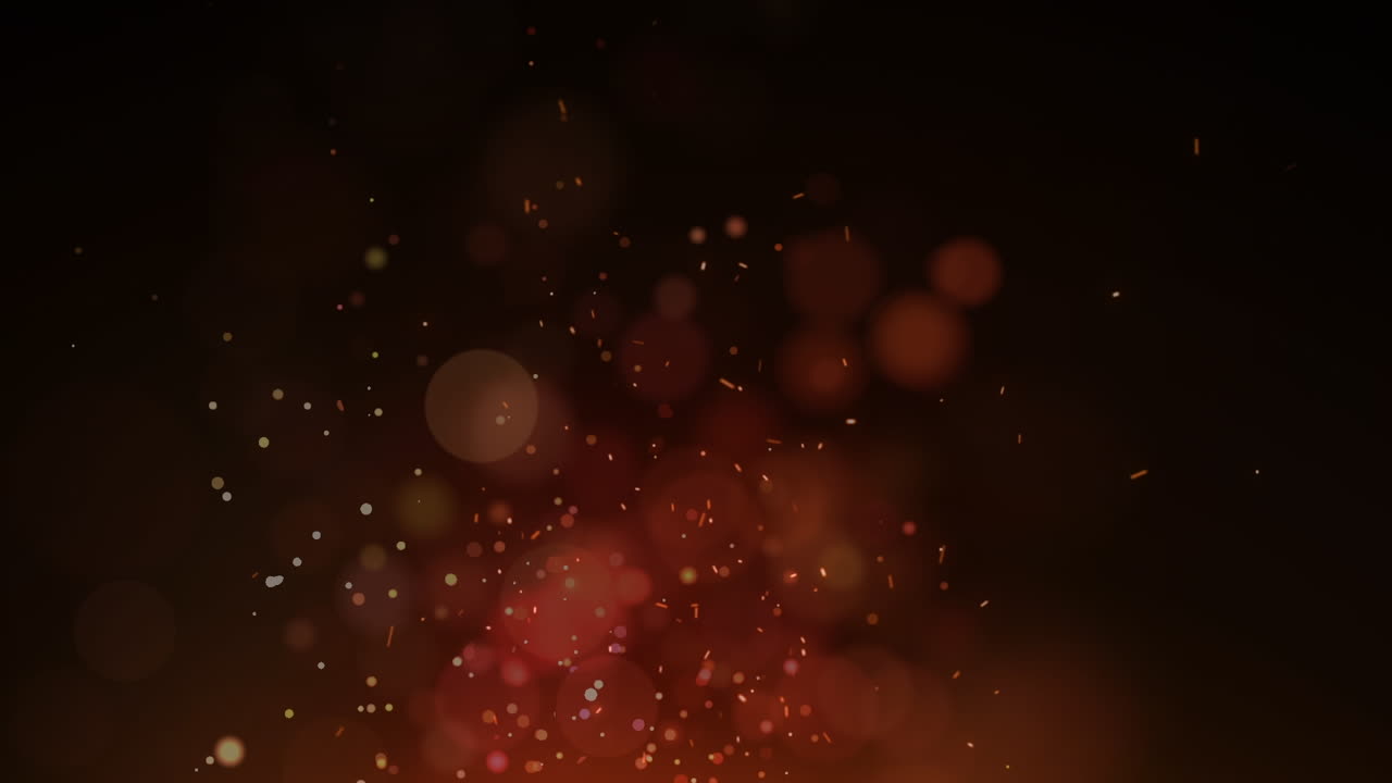 Animation of digital fire sparks and lens flares moving in seamless loop over black background