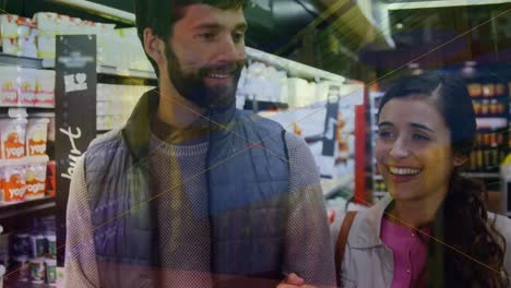 animación del procesamiento de datos financieros sobre las compras de la pareja caucásica.