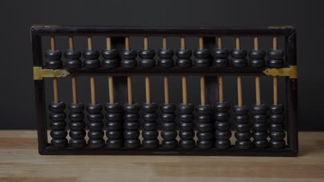 zoom in on an old, vintage abacus