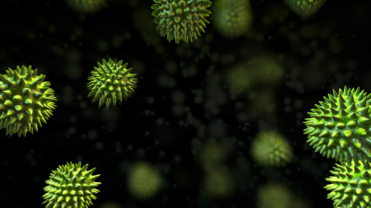 Green virus moving toward dark background