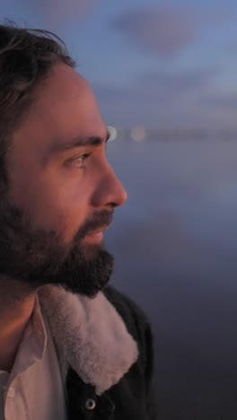 portraits of a bearded man at dusk
