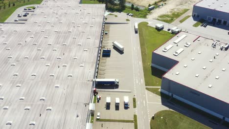 aerial view of warehouse storages or industrial factory or logistics center from above