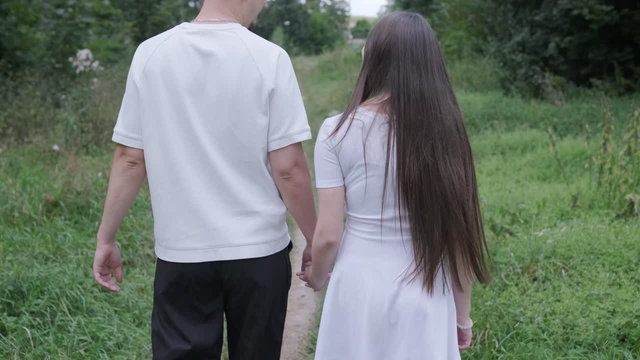 Couple walking on a path