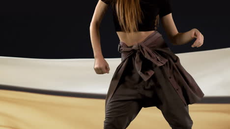 Animation-of-caucasian-woman-dancing-over-floating-cloth-on-black-background