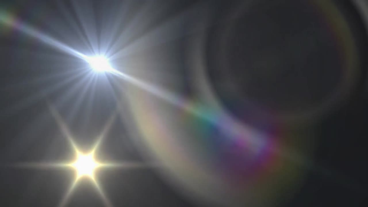 검은 바탕에서 움직이는 빛의 반점의 애니메이션