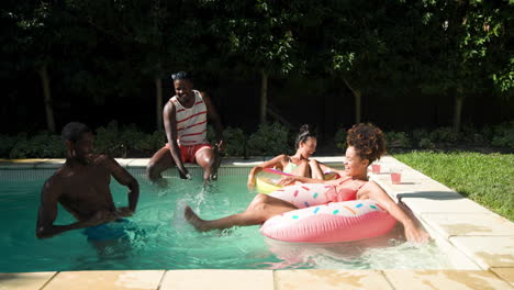diverse friends relaxing on colorful pool floats, enjoying sunny day by water