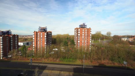 High-rise-tower-blocks,-flats-built-in-the-city-of-Stoke-on-Trent-to-accommodate-the-increasing-population,-housing-crisis-and-over-crowding,-immigration-housing