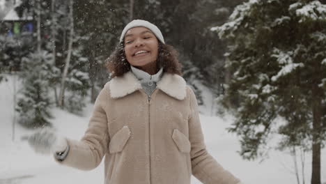 girl enjoying snowfall