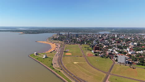 orbit drone shot of playa san jose in encarnacion in the day in paraguay