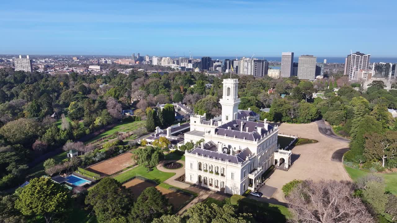 Aerial around Melbourne Government House showcasing pool and tennis courts