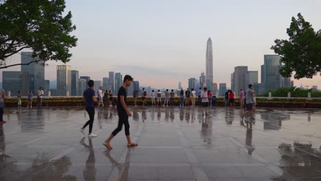 sunset sky shenzhen downtown park view point wet floor slow motion panorama 4k china