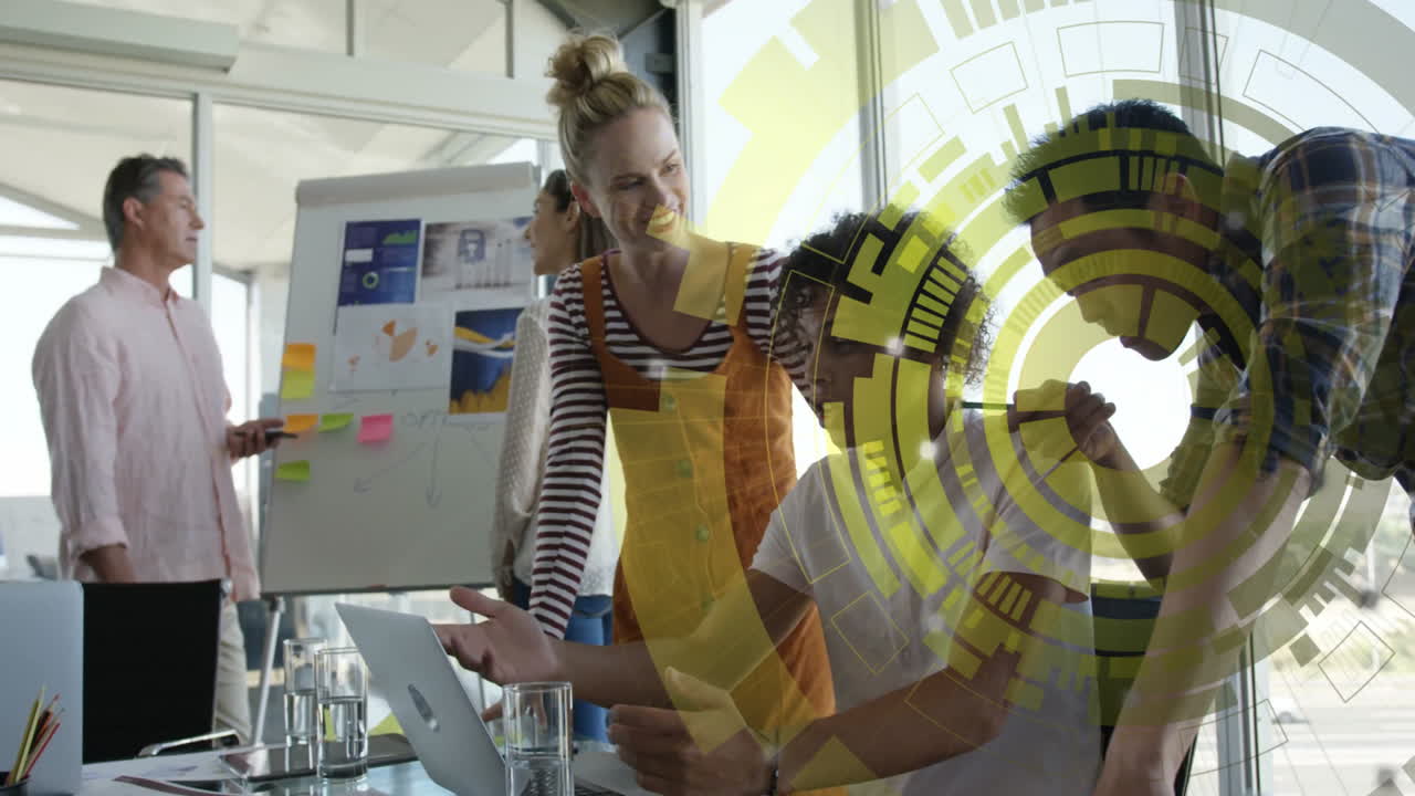 Collaborating on project, team using digital animation interface in modern office