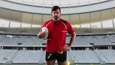 Professional-rugby-player-standing-in-front-of-a-stadium-with-confetti-falling